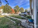 Neat front yard with a walkway leading to the entrance of the house at 412 E 18Th St, Charlotte, NC 28206