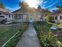 Charming single-story house with a well-maintained lawn and walkway at 412 E 18Th St, Charlotte, NC 28206
