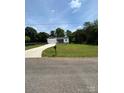House on a large lot with a long driveway and mature trees at 4050 Fairview Ln, Maiden, NC 28650