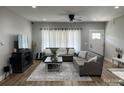 Spacious living room with sectional sofa, large TV, and fireplace at 4050 Fairview Ln, Maiden, NC 28650