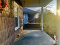 Front porch features a wooden swing and is partially covered at 84 Walnut Ave, Gastonia, NC 28054