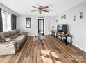 Living room with hardwood floors and a comfy couch at 330 Crocker Rd, Kings Mountain, NC 28086