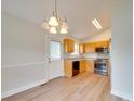 Kitchen with stainless steel appliances and light wood cabinets at 1205 Danielle Downs Ct, Concord, NC 28025