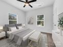 Virtually staged bedroom with a cozy atmosphere and ample natural light at 103 Pleasant Hill St, Lancaster, SC 29720