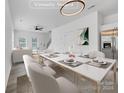 Bright dining area with a large table, perfect for Gathering gatherings at 103 Pleasant Hill St, Lancaster, SC 29720
