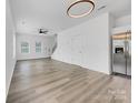 Spacious living room featuring hardwood floors and lots of natural light at 103 Pleasant Hill St, Lancaster, SC 29720