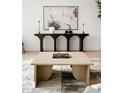 Modern living room with light oak coffee table and black console table at 237 Marsh Rd # 101, Charlotte, NC 28209