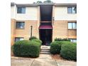 Brick building exterior with stairs and awning at 4821 Spring Lake Dr # C, Charlotte, NC 28212