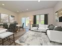 Bright living room with access to back patio at 1253 Falling Acorn Ln, Concord, NC 28027