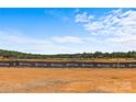 Aerial view of undeveloped land with construction equipment at 5621 Mount Olive Church Rd, Charlotte, NC 28278