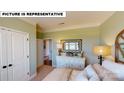 Spacious bedroom with double doors and ample closet space at 125 Sari St, Troutman, NC 28166