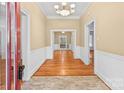 Bright entryway with hardwood floors and chandelier at 405 7Th St, Spencer, NC 28159