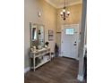 Inviting entryway with decorative console table and chandelier at 3486 Mason Spring Dr, Lincolnton, NC 28092