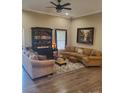Spacious living room featuring comfortable seating and hardwood floors at 3486 Mason Spring Dr, Lincolnton, NC 28092