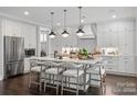Modern kitchen with large island and stainless steel appliances at 2008 Stratford Ave, Charlotte, NC 28205