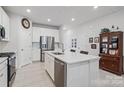 Spacious kitchen featuring stainless steel appliances and an island at 939 Cobbled Way, Fort Mill, SC 29715