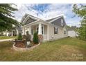 Two-story home with landscaped yard at 14217 Ridgewater Way, Charlotte, NC 28278