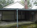 Simple carport structure attached to the back of the house at 812 Cleveland Ave, Kings Mountain, NC 28086