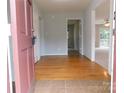 Bright entryway with hardwood floors and access to other rooms at 8885 Brandon Cir, Concord, NC 28025