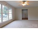 Living room with hardwood floors and access to other rooms at 8885 Brandon Cir, Concord, NC 28025