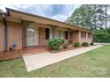 Brick ranch house with a covered porch at 900 Nance St, Kannapolis, NC 28083