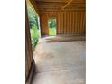 Unfinished garage interior of a house under construction, with concrete flooring at 4293 Brandy Creek Ct # 91, Clover, SC 29710