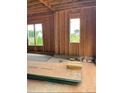 Interior framing of a new home under construction, showcasing large windows and open floor plan at 4293 Brandy Creek Ct # 91, Clover, SC 29710