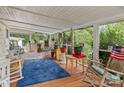Spacious screened porch, perfect for outdoor relaxation at 7676 Shoupes Grove Church Rd, Hickory, NC 28612