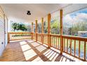 Wooden porch with wooden railings and a view of nature at 185 17Th Se St, Hickory, NC 28602