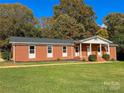 Brick ranch house with covered porch at 114 Bass Ln, Statesville, NC 28625