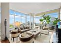 Luxurious living room with floor-to-ceiling windows at 215 N Pine St # 3705, Charlotte, NC 28202