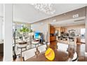 Open concept dining room and kitchen with modern design at 215 N Pine St # 3705, Charlotte, NC 28202