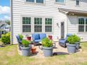 Cozy patio with seating area and potted plants at 775 Kathy Dianne Dr, Fort Mill, SC 29707