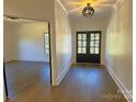 Bright entry hall with hardwood floors, leading to bedrooms and formal living areas at 444 19Th Avenue Nw Cir, Hickory, NC 28601
