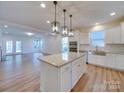 Spacious kitchen featuring a large island and stainless steel appliances at 2716 Manor Stone Way, Indian Trail, NC 28079