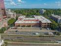 Brick building with ample parking and urban surroundings at 310 Arlington Ave # Multiple, Charlotte, NC 28203