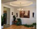 Spacious dining room with hardwood floors and a chandelier at 4016 Holly Villa Cir, Indian Trail, NC 28079