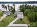 Aerial view of two story house with private dock and lake access at 10273 Lakeshore Dr, Lancaster, SC 29720