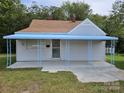 House exterior, light blue awning, small yard at 145 33Rd Sw St, Hickory, NC 28602