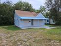 House exterior, light blue awning, small yard at 145 33Rd Sw St, Hickory, NC 28602