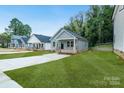 New construction homes with well-maintained lawns at 602 Meadow Ave, Spencer, NC 28144