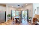 Bright dining area with table and chairs, access to backyard patio at 2413 Riparian Way, Denver, NC 28037