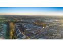 Aerial view of neighborhood with houses and pool at 5015 Mockernut Ln, Indian Land, SC 29707