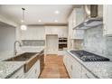 Modern kitchen with white cabinets, granite counters, and stainless steel appliances at 0002 Bolton Rd, Catawba, NC 28609