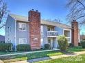 Two-story condominium building with brick accents and balconies at 6132 Heath Ridge Ct, Charlotte, NC 28210