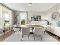 Dining room with modern decor and large windows at 124 Balboa St # 26, Matthews, NC 28104