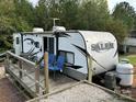 Salem travel trailer with deck and storage shed at 145 Marina Dr, New London, NC 28127