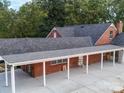 Brick house with carport and large backyard at 3980 Fish Pond Rd, Salisbury, NC 28146