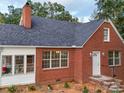 Brick house exterior with a gray roof and landscaping at 3980 Fish Pond Rd, Salisbury, NC 28146