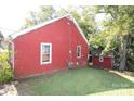 Red brick side of house with small shed and yard at 713 Sikes Ave # 2, Wadesboro, NC 28170